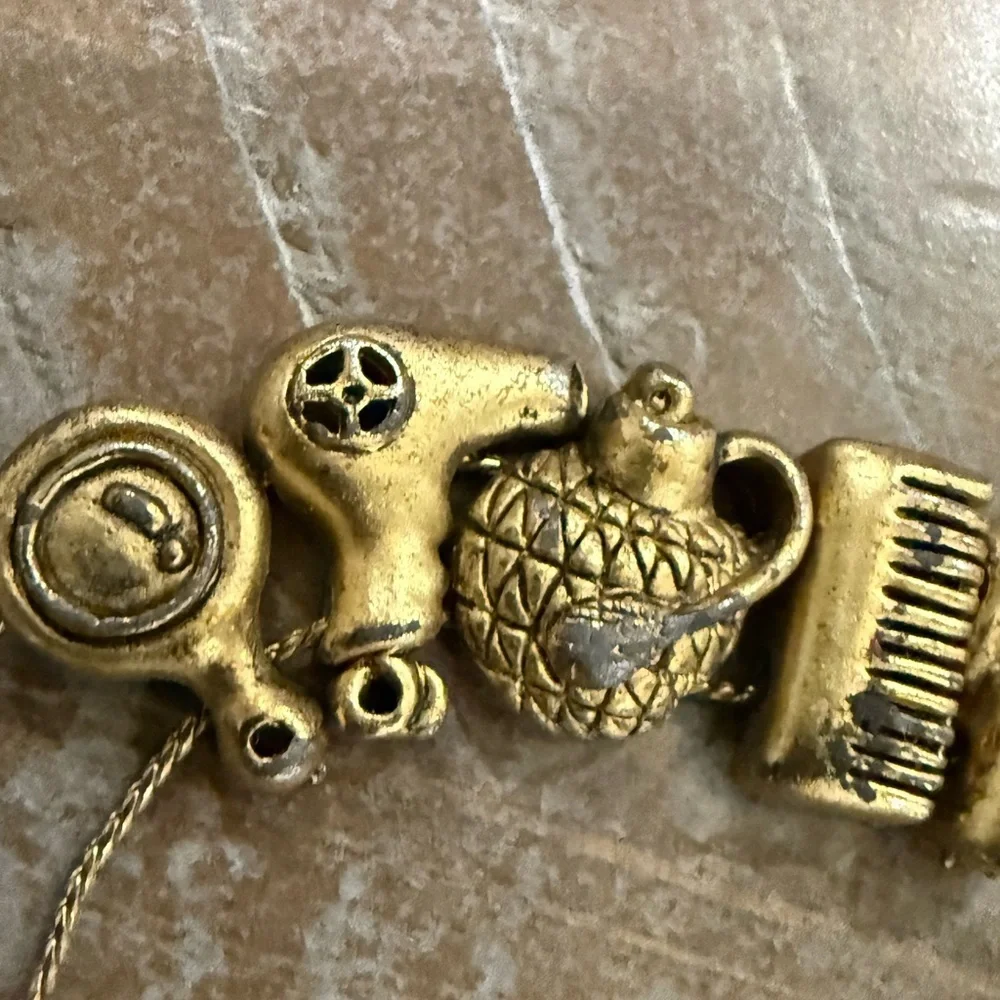 Vintage Hair and Makeup Gold Tone Charm Bracelet